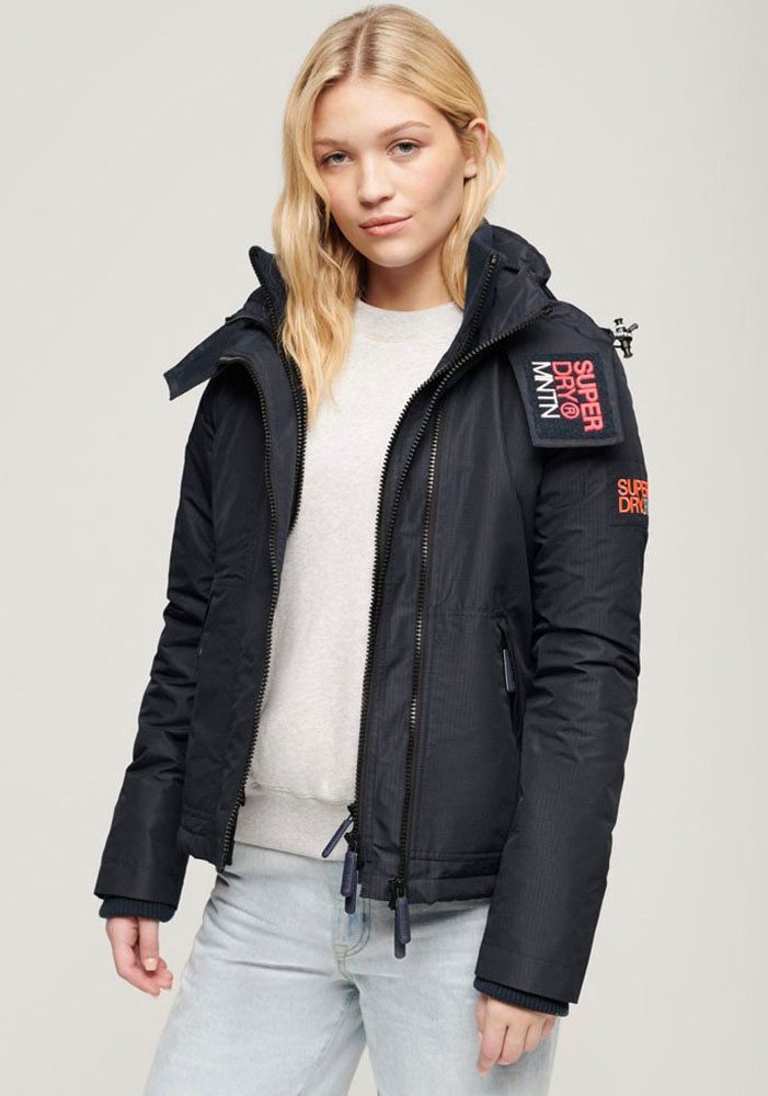 superdry-jacke-645cmp-1.jpg Superdry Outdoorjacke HOODED MTN WINDBREAKER JACKET Slim Fit, winddicht, mit Reißverschluss, aus Polyester und Webmaterial – Bild 1