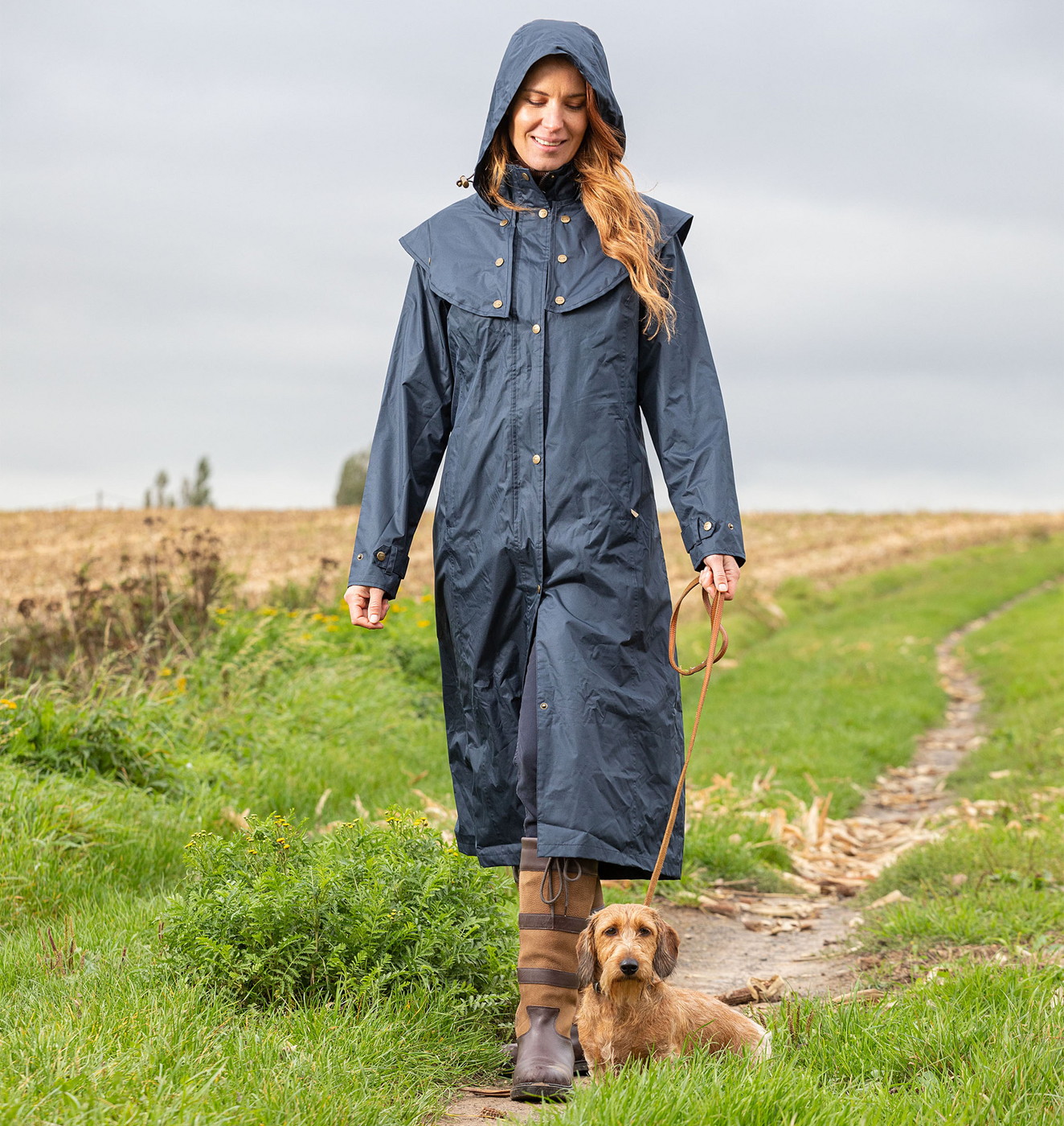 wasserdichte-regenjacke-damen-791zam-1.jpg Wasserdichte Regenjacke Regenmantel Wandern Damen Lange Regenmäntel Für Damen • Wasserdicht Und Atmungsaktiv TRUE – Bild 1